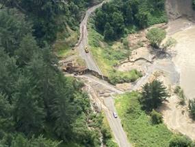 A road with cars on it

AI-generated content may be incorrect.