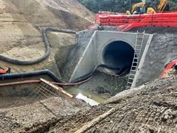 A hole in the ground with a pipe in it

AI-generated content may be incorrect.